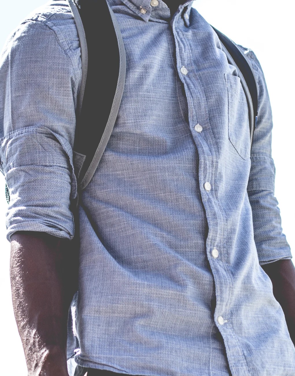 Fabric with a selection: shirt creases softened, weave and pocket kept — before